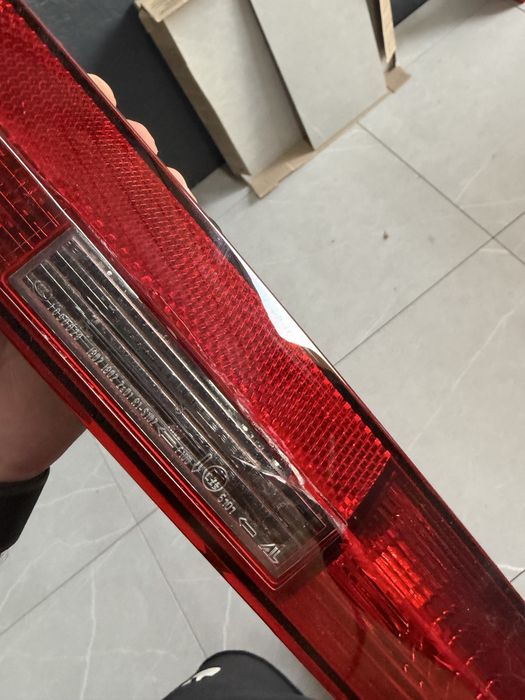 Задний фонарь в бампер на Audi Q7 официал левый