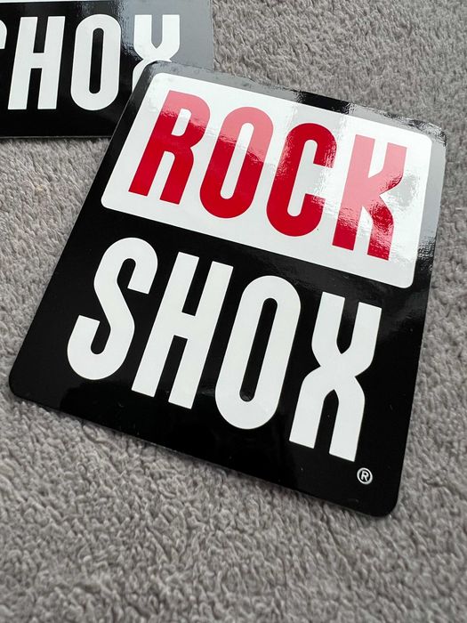 3 naklejki firmy Rock Shox. Wymiary - 65 mm x 75 mm