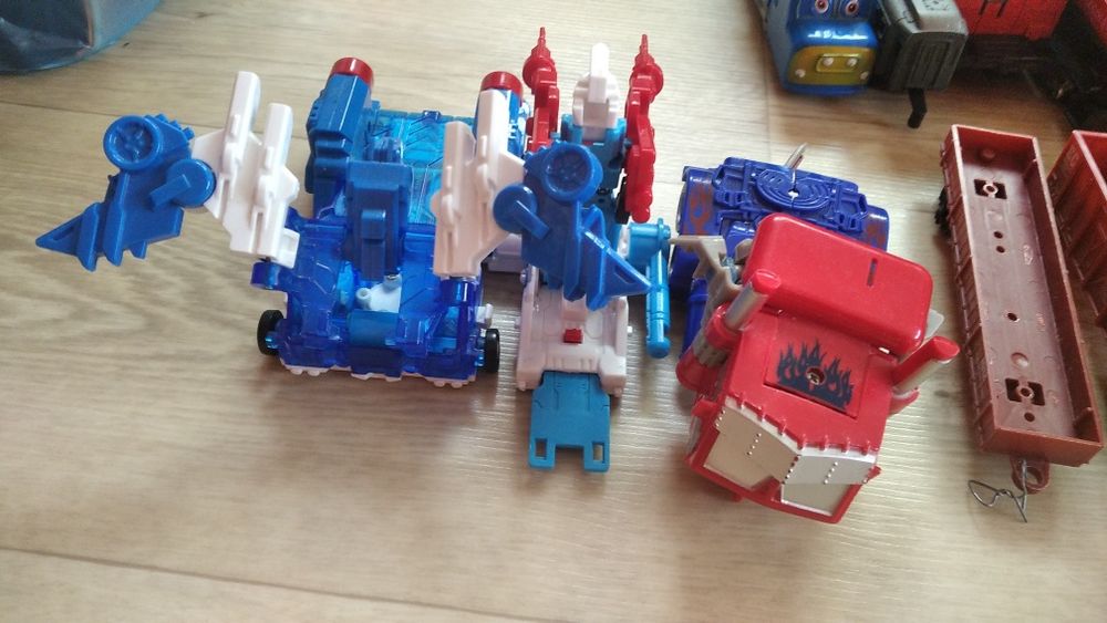 Поезда, трансформеры и скритчеры,трактор с прицепом