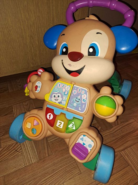 zabawka popychacz grający