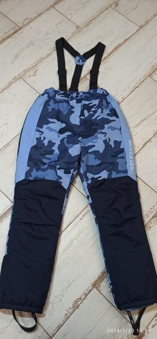 Nowe spodnie zimowe na szelkach dla chłopca 128