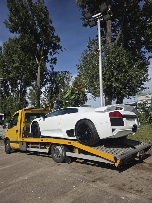 Pomoc drogowa 24 Laweta Transport samochodów towarów Autolaweta