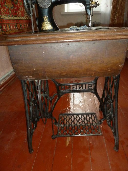 Антикварная швейная машина Singer