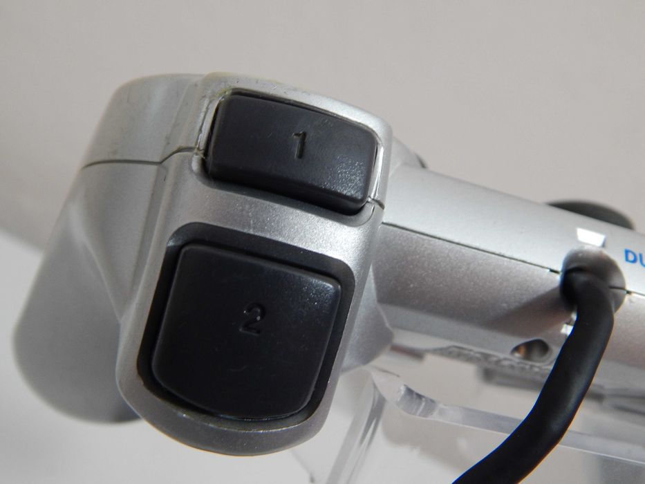 Oryginalny Srebrny Silver kontroler gamepad DualShock 2 do PlayStation 2 Sony stan dobry