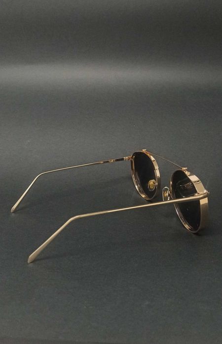 Óculos dourados novos