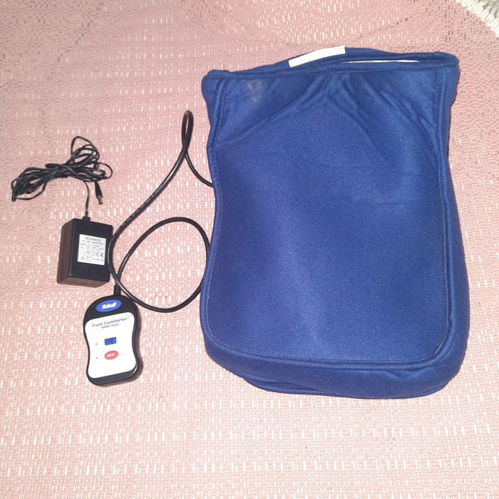 Масажери для ніг Scholl з підігрівом.