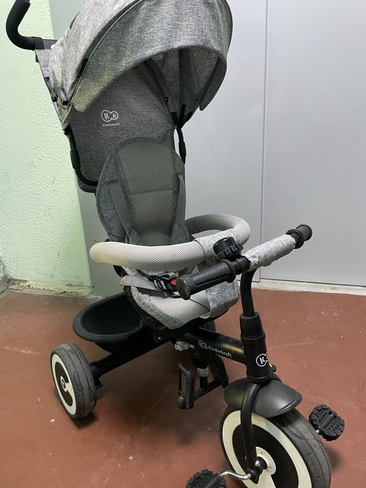 Kinderkraft ASTON — триколісний велосипед-коляска з батьківською ручкою