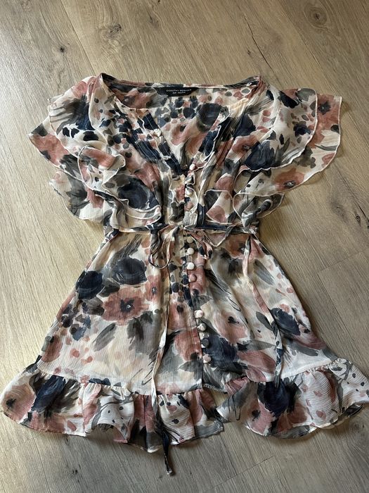 Damska bluzka na krótki rękaw z falbankami, rozmiar 38 M, stan idealny