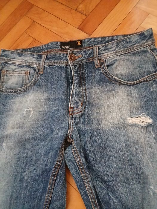 Spodnie jeans męskie z przetarciami  New Yorker  34