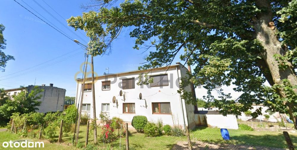 Działka pod inwestycję z istniejącą zabudową