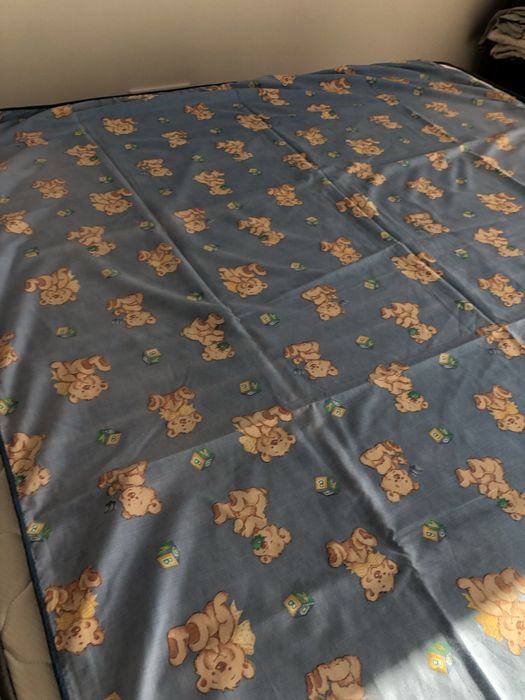 Colcha infantil com bonecos para cama de solteiro