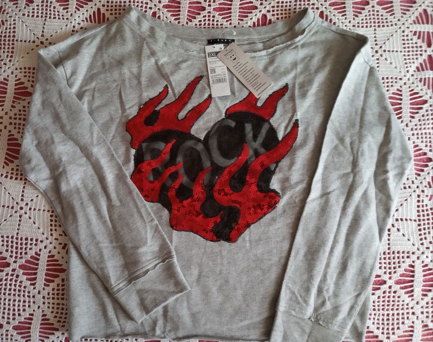 Two new sweatshirts "with their respective labels"