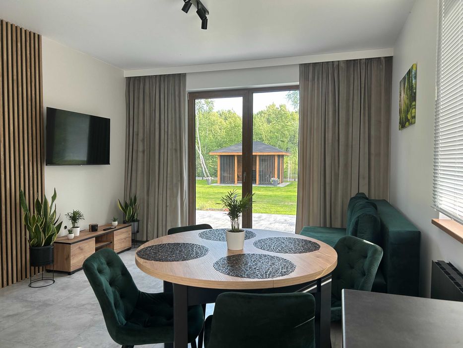 Pod Brzozami-domki całoroczne Balia jacuzzi noclegi Bałtów