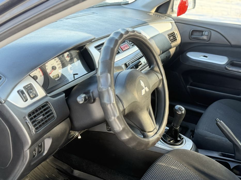 Продам  Mitsubishi Lancer