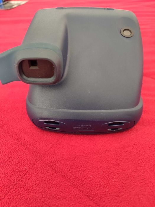 Máquina fotográfica Polaroid antiga