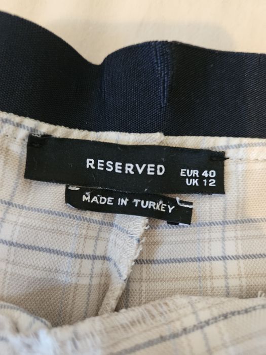 Spodnie Reserved rozm. 40