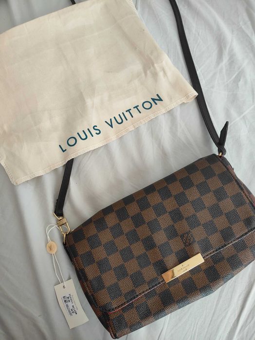 Mala tiracolo castanha