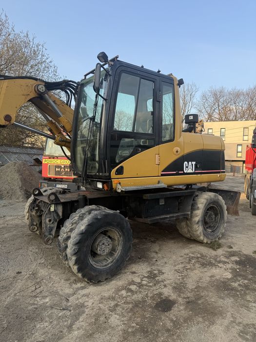 Koparka cat 313c Rototilt