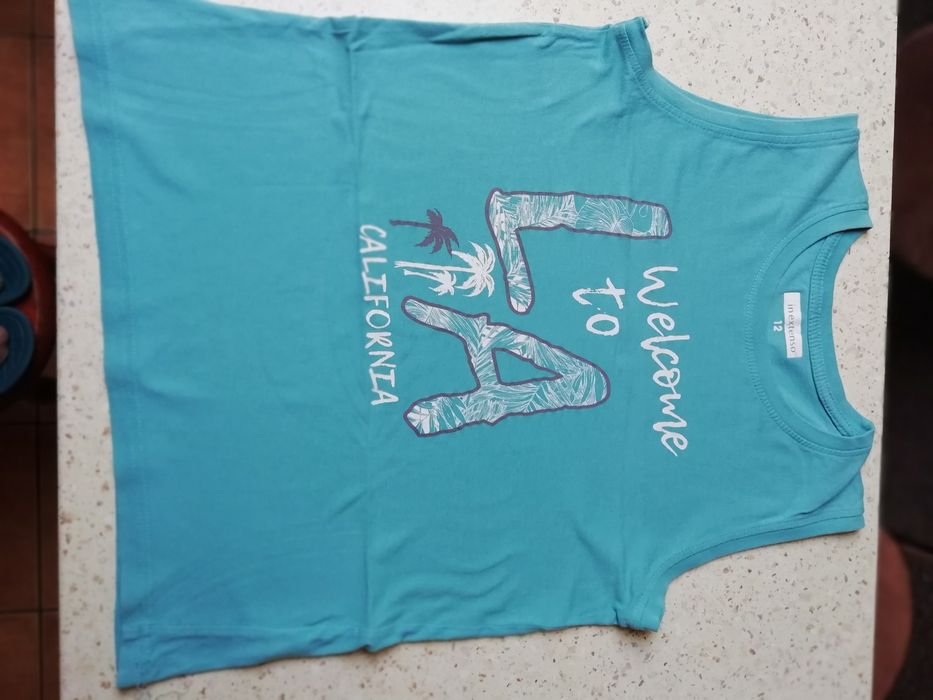 Koszulka chłopięca in extenso rozmiar 146.