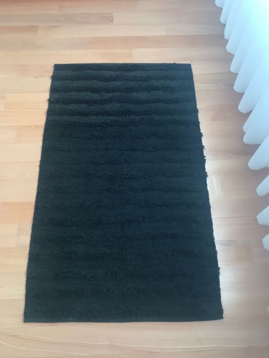 Tapete de riscas preto