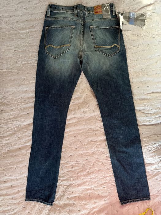 Nowe dżinsy męskie slim leg W33 L34
