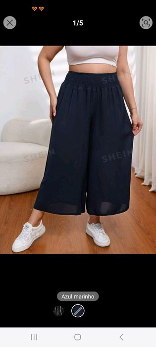 Calças largas de tecido