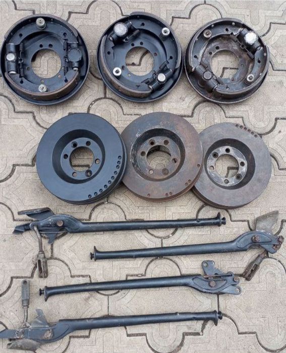 Ручники,барабаны,стояночный тормоз Уаз,опорные диски,колодки,рычаги.