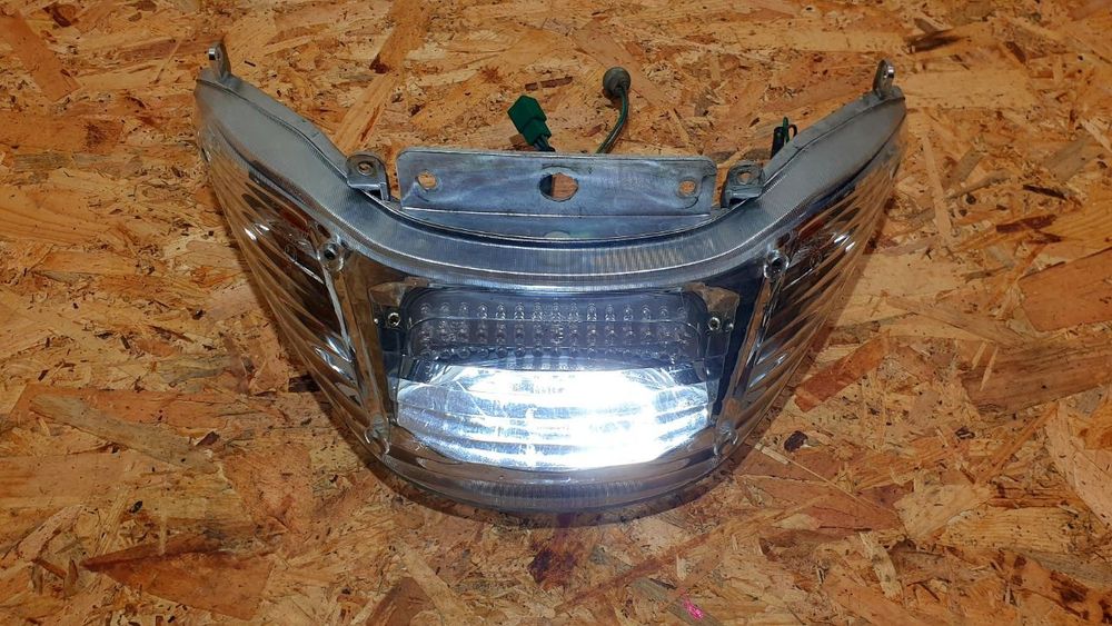 Фонарь задний Kymco Xciting 500