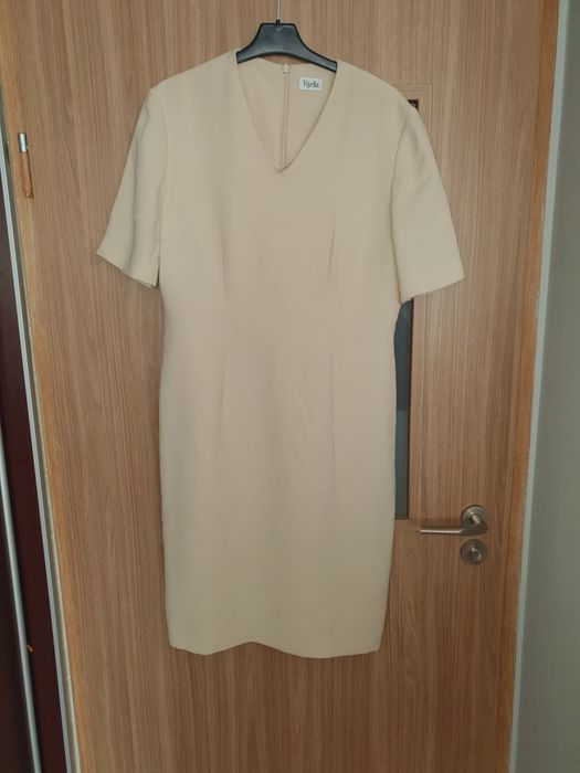 Kremowa  elegancka sukienka  roz 38