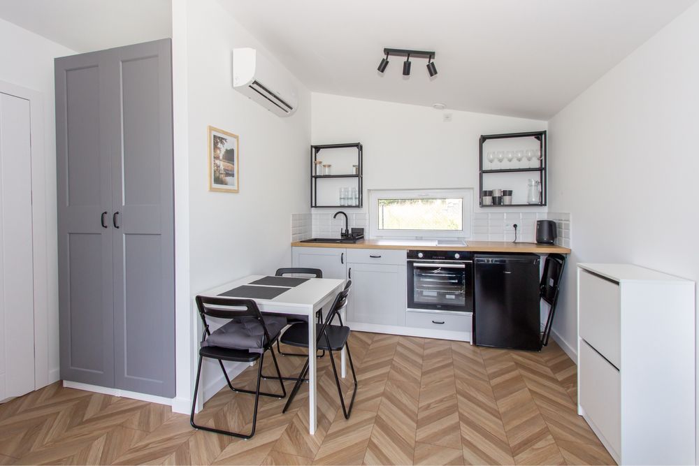 Domek letniskowy z widokiem na jezioro Spore