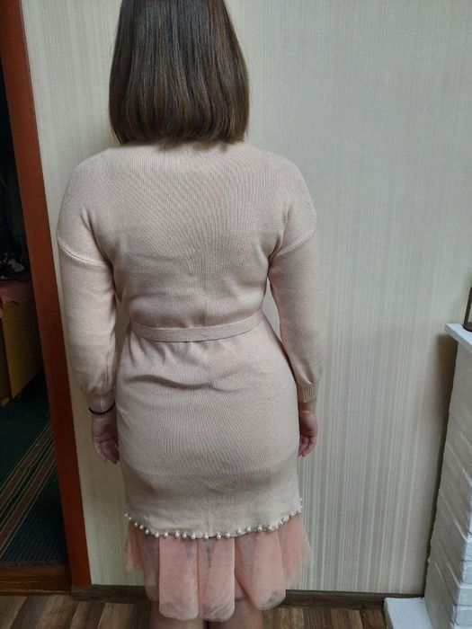 Тепле пляття ніжно персикового кольору