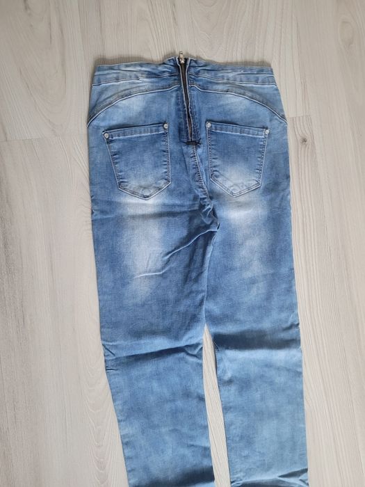 Spodnie jeans M damskie