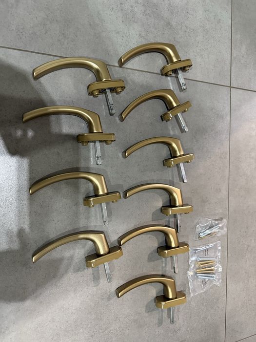 Oryginalne klamki dako zlote jak nowe