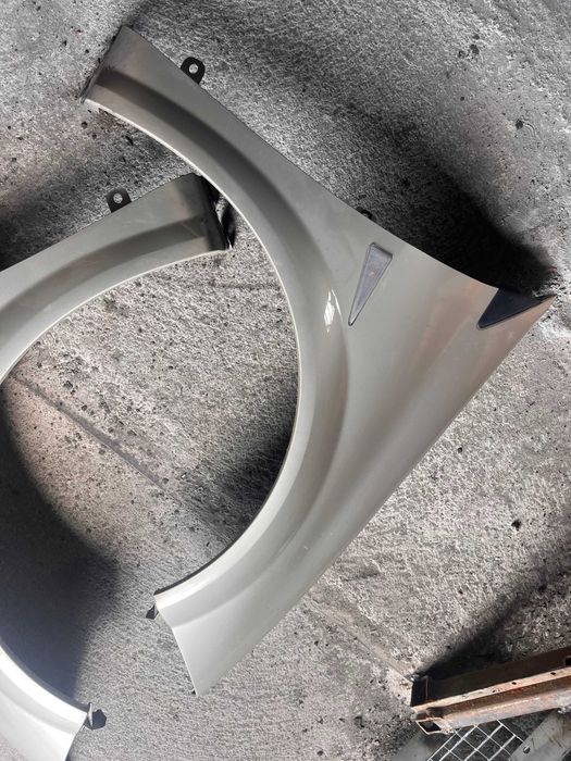 Renault Megane 2 Lift     Błotniki  Kod lakieru TED 11