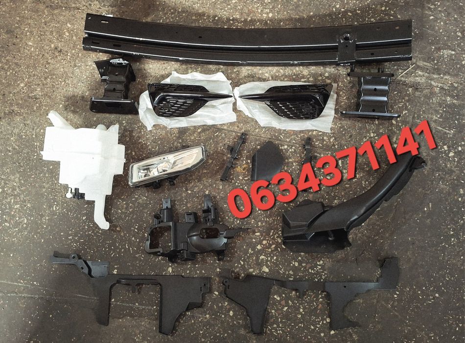 Підсилювач Нісан Рог Спорт 620306MD0A бампер решітка заглушк кріплення F22156MAMH підкрилок фара туманка