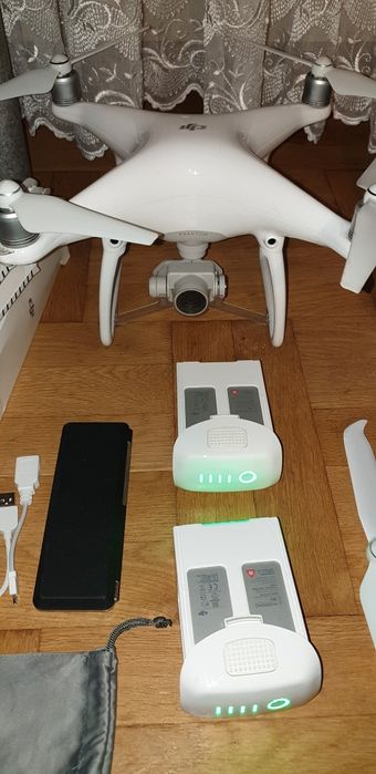 DJI phantom 4 + 2 baterii + osłony śmigieł