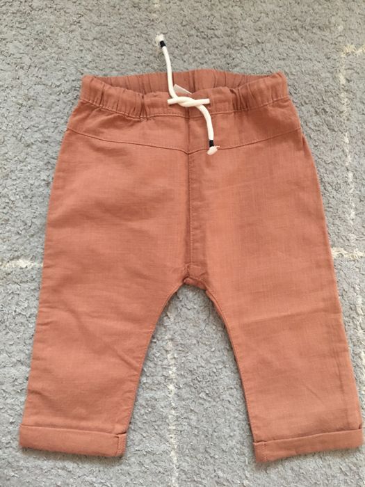 Nowe tkaninowe spodnie r.80 H&M