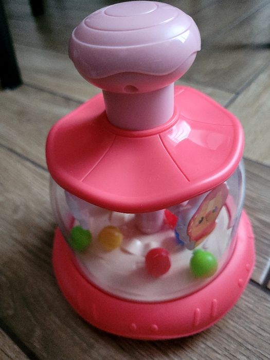 Zabawka bączek z kuleczkami