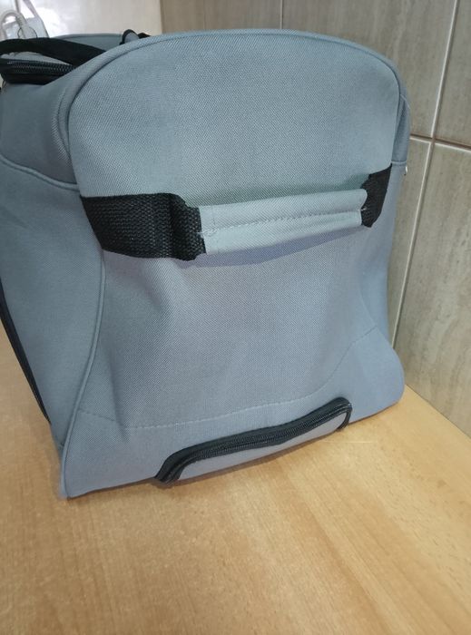 Duża torba podróżna na kółkach 70x35x35 cm 80L