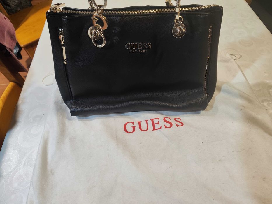 Mala Guess como nova