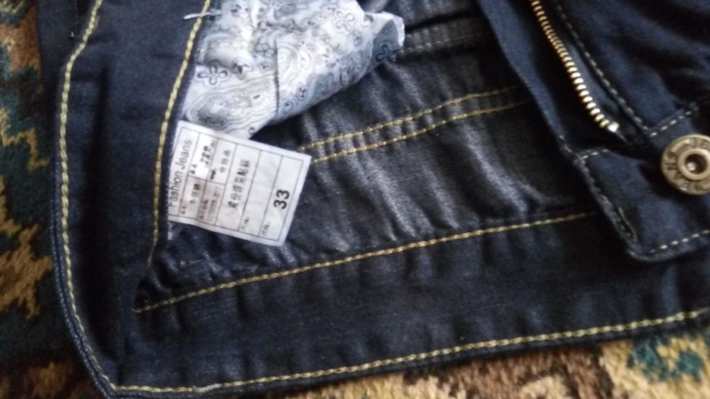 Продам новые джинсовые летние брюки.