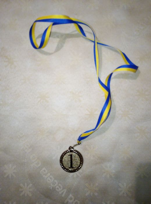Медаль спортивная.