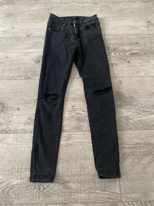 Czarne spodnie rurki Answear 36