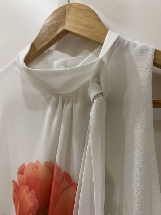 Top com detalhes