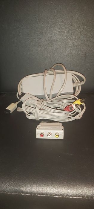 Nintendo Wii com comandos e jogos