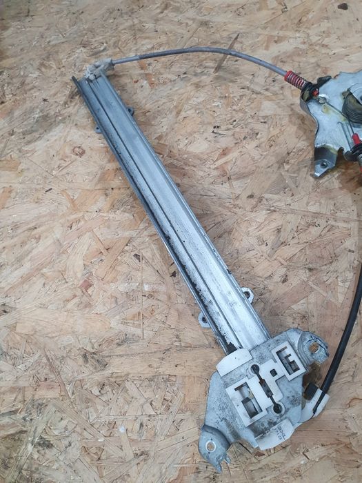 Mechanizm szyby silniczek lewy Nissan Micra k12 04r 3 drzwi