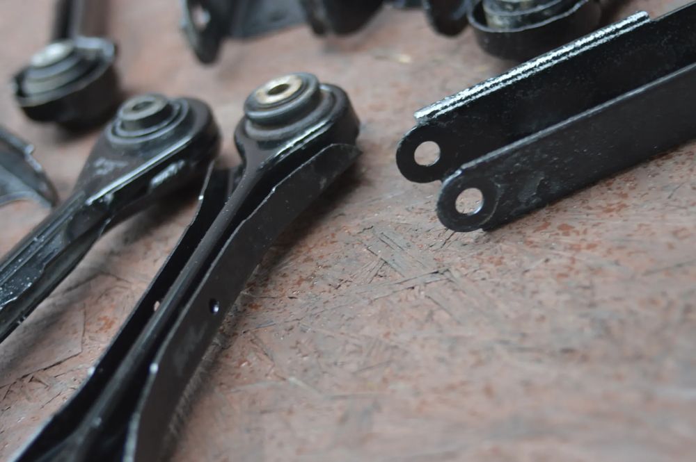 bmw e90 / e81 / e87 / e91 / e92 / e93 oryginalne wahacze tył lewe / p