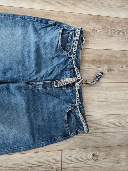 Spodnie jeansowe damskie z paseczkiem r. 52