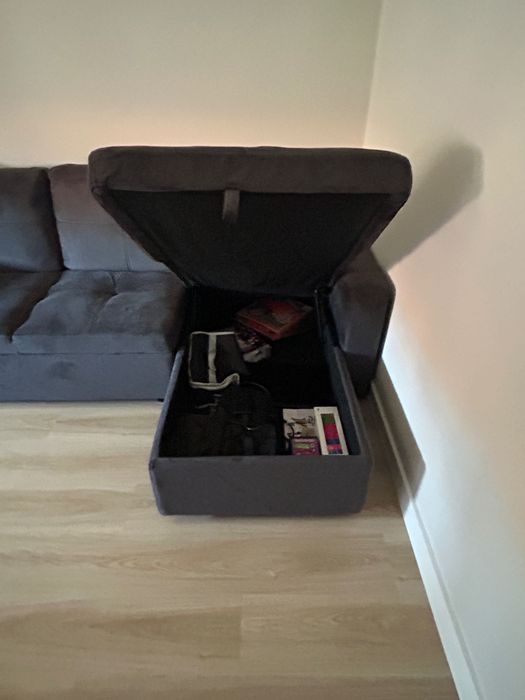 Sofá cama com chaise longue e arrumação – Cinzento escuro | Conforama