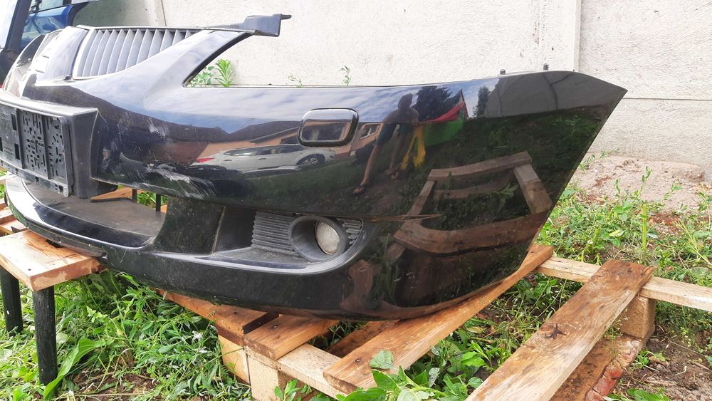 Mitsubishi Lancer VII 7 zderzak przedni kompletny spryski halogeny